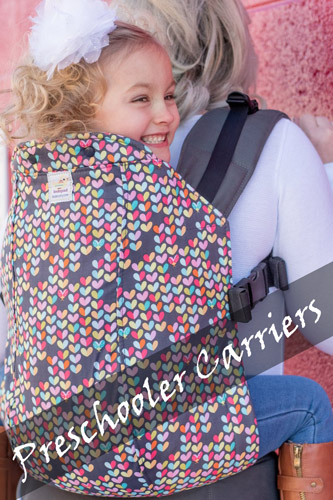 Girl in Kinderpack Preschooler Carrier
